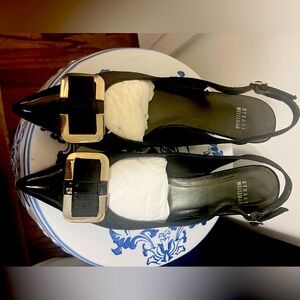 Stuart Weitzman Black Patent Leather Sling back low heel. Used good condition